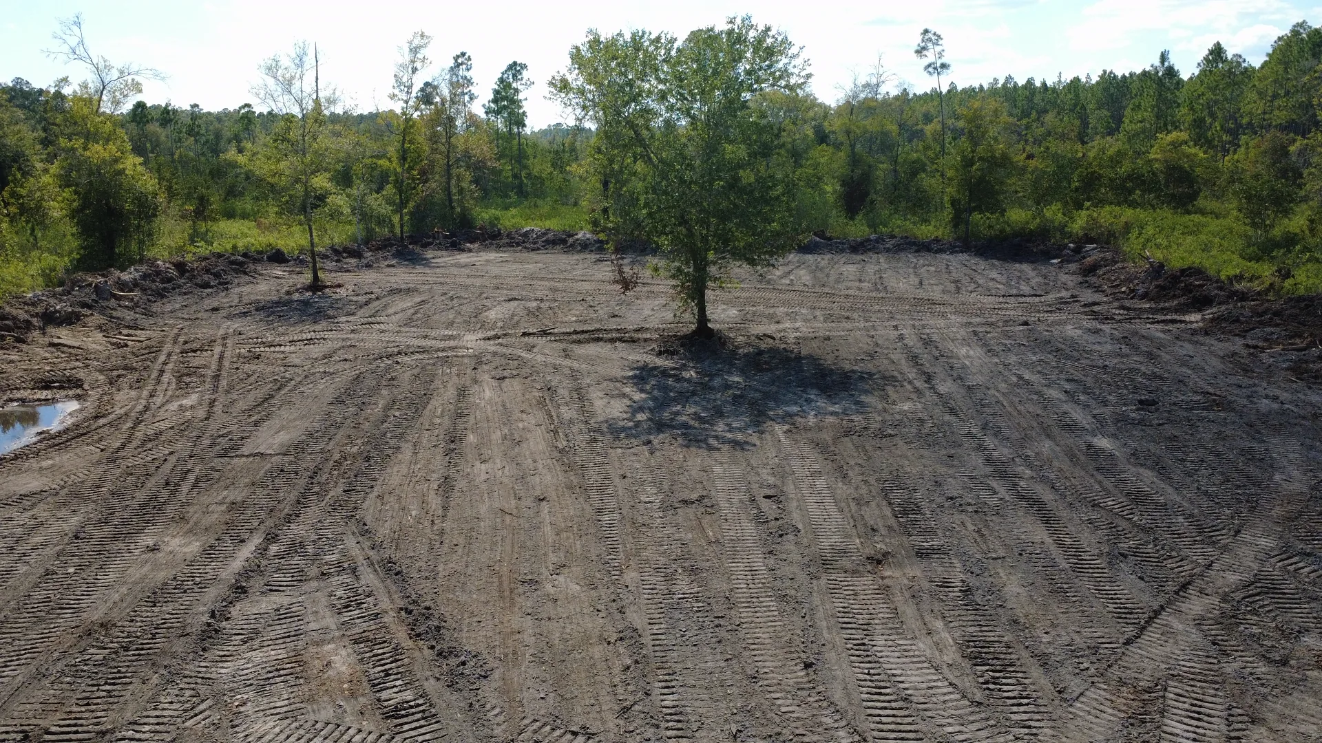 Drone view of a freshly cleared and graded homesite pad in Bradford County, Florida